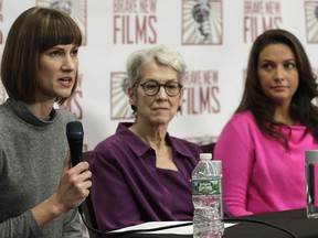 Rachel Crooks, left, Jessica Leeds, center, and Samantha Holvey attend a news conference, Monday, Dec. 11, 2017, in New York to discuss their accusations of sexual misconduct against Donald Trump. The women, who first shared their stories before the November 2016 election, called for a congressional investigation into Trump's alleged behavior.