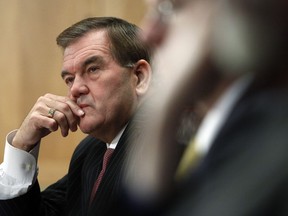 FILE- This Oct. 22, 2009 file photo shows former Homeland Security Secretary Tom Ridge testifying on Capitol Hill in Washington before the Senate Homeland Security and Governmental Affairs Committee. Ridge is out of the hospital more than two weeks after suffering a heart attack and is continuing his recovery in a Texas rehabilitation facility. A Tuesday, Dec. 5, 2017 statement issued through a family spokesman quoted Ridge saying he's making great progress and feeling much better.