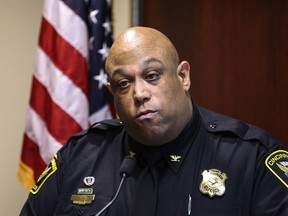 Cincinnati Police Department Chief Eliot Isaac addresses the media at a press conference Thursday, Dec. 21, 2017, in regard to the active shooter at a University of Cincinnati hospital facility the previous day.  Isaac identified the gunman as 20-year-old Isaiah Currie of Cincinnati. Isaac says it's too early in the case to say what Currie's motive was, but that he had a record of multiple crimes.