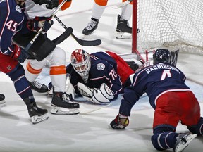 Columbus Blue Jackets goalie Sergei Bobrovsky (72) makes a save against Philadelphia Flyers during the second period of an NHL hockey game in Columbus, Ohio, Saturday, Dec. 23, 2017.