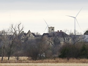 FILE - In this Wednesday, Nov. 29, 2017 file photo, buildings at the abandoned Chilocco Indian School campus are pictured in Newkirk, Okla, Five American Indian tribes are opposing plans by the U.S. Department of Homeland Security to conduct bioterrorism drills at a tribal burial ground and abandoned boarding school, saying the agency didn't tell them that "potentially dangerous substances" could be used there.