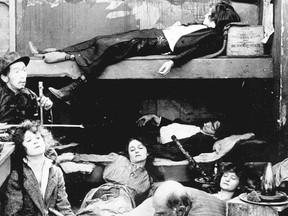 'Innocent young white girls' with Chinese men in an opium den, from the 1916 U.S. movie The Dividend.