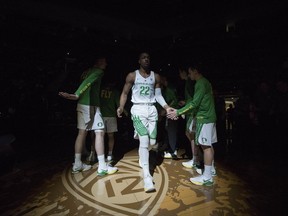 Oregon forward Mikyle McIntosh (22), is introduced before playing Utah in an NCAA college basketball game Friday, Dec. 29, 2017 in Eugene, Ore.