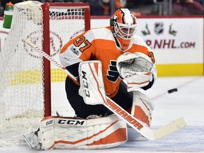 Philadelphia Flyers goalie Brian Elliott makes a save during the first period of an NHL hockey game against the Dallas Stars, Saturday, Dec. 16, 2017, in Philadelphia.
