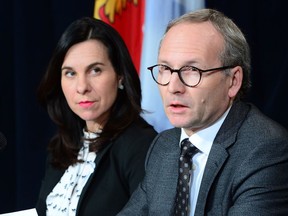 Quebec Public Security Minister Martin Coiteux and Montreal Mayor Valerie Plante attend a news conference in Montreal, Wednesday, Dec.6, 2017.