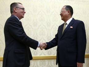 North Korean Foreign Minister Ri Yong Ho, right, and U.N. undersecretary-general for political affairs Jeffrey Feltman shake hands at the Mansudae Assembly Hall in Pyongyang, North Korea Thursday, Dec. 7, 2017. The senior United Nations official is on a four-day visit to the country at the invitation of the North Korean government.