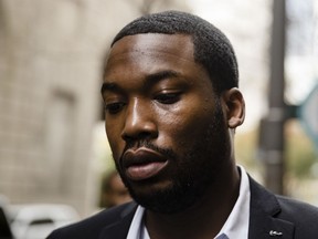 In this Nov. 6, 2017 photo, rapper Meek Mill arrives at the criminal justice center in Philadelphia. Common Pleas Judge Genece Brinkley on Friday, Dec. 1, 2017 denied a motion allow the 30-year-old rapper to be bailed out of a Pennsylvania correctional facility. Mill was sentenced last month to two to four years for violating probation on a roughly decade-old gun and drug case.