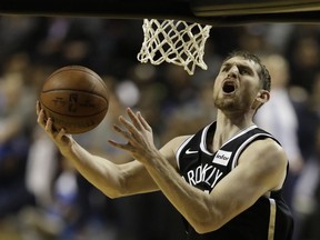 Brooklyn Nets' Tyler Zeller goes to the basket to score in the first half of a regular-season NBA basketball game with Oklahoma City Thunder in Mexico City, Thursday, Dec. 7, 2017.