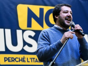Northern League party leader Matteo Salvini delivers a speech during a demonstration against the Ius Soli law granting citizenship to immigrants' children in Rome, Sunday, Dec. 10, 2017. Opposition leaders accuse the Democrat-led government of being too accommodating toward migrants, who have arrived by the hundreds of thousands in the last few years after being rescued at sea from smugglers' boats that left the lawless shores of Libya.