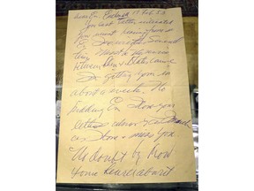 This Dec. 22, 2017, photo shows part of a letter in Biddeford, Maine,,written by Boston Red Sox slugger Ted Williams the day after he crash-landed his airplane during the Korean War. Thirty-eight letters from Williams to his girlfriend at the time are going to be auctioned on Jan. 3, 2018, at Saco River Auction in Biddeford.