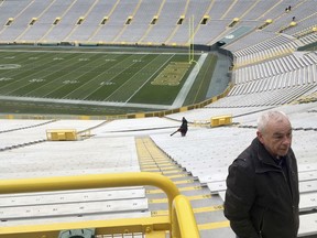 In this Dec. 6, 2017, photo, Patrick Webb, executive director of the Green Bay/Brown County Professional Football Stadium District, recalls watching a game known as the "Ice Bowl," at Lambeau Field in Green Bay, Wis. Webb spoke from near the spot where he stood during the game 50 years ago between the Dallas Cowboys and Green Bay Packers played in sub-zero temperatures.
