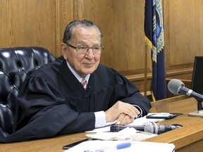 FILE - In this Aug. 10, 2017 file photo, Providence Municipal Court Judge Frank Caprio sits on the bench in Providence, R.I. The television program featuring the 81-year-old judge, who made a splash on social media, is going national. The producers of the local show "Caught in Providence" have struck a deal with FOX Television Stations to air the show in major media markets starting in the fall of 2018.