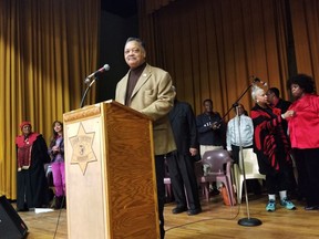 The Rev. Jesse Jackson addresses inmates at Cook County Jail during a Christmas Day sermon on Monday, Dec. 25, 2017, in Chicago. Jackson disclosed a 2015 diagnosis of Parkinson's disease last month. The 76-year-old said he's trying to manage progression of the disease with daily medication, physical therapy and prayer.