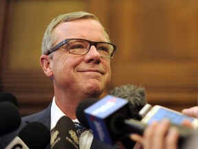 Premier Brad Wall speaks to reporters following his last question period at the Saskatchewan Legislature on Dec. 7, 2017. The governing Saskatchewan Party, the Opposition New Democrats and even the seatless Liberals will elect new leaders in the coming months, and that could affect the decade-long political status quo in the province.