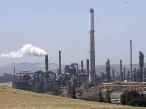 FILE - This July 12, 2017 file photo shows the Valero Benicia Refinery in Benicia, Calif. California Attorney General Xavier Becerra announced, Thursday, Dec. 7 that California is among fourteen states and the District of Columbia that are suing the Trump administration over what they say is a failure to enforce smog standards.
