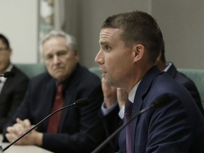 State Sen. Mark McGuire, D-Healdsburg, questions Mark Ghilarducci, director of the California Office of Emergency Services, about the vulnerability of public safety warnings, Monday, Dec. 4, 2017, in Sacramento, Calif. Ghilarducci spoke at a legislative hearing Monday on the failures in emergency-warning systems in October's wildfires.