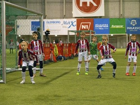 Young soccer players prepare for a corner kick during a tournament in Kopavogur on the outskirts of Reykjavik, Sunday, Nov. 26, 2017. The latest achievement has left many wondering if the island nation of nearly 340,000 people is benefiting from its investment in the sport, or is it only temporary success.
