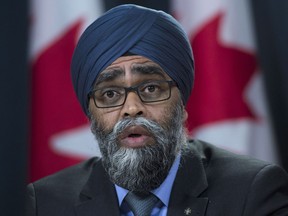 Defence Minister Harjit Sajjan speaks at an announcement on fighter jets at the National Press Theatre in Ottawa on Tuesday, Dec. 12, 2017.