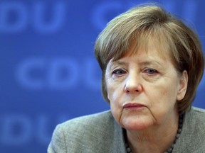 German Chancellor and Chairwoman of the German Christian Democratic Party (CDU), Angela Merkel, attends a party's board meeting in Berlin, Germany, Monday, Dec. 18, 2017.