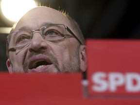 Martin Schulz, chairman of the German Social Democrats, SPD, addresses the media during a news conference in Berlin, Germany, Friday, Dec. 15, 2017. Leaders of Germany's center-left Social Democrats have agreed to enter exploratory talks on a new government led by Chancellor Angela Merkel.