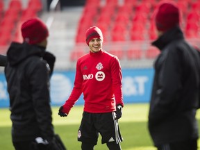 Toronto FC forward Sebastian Giovinco, centre, laughs with teammates during practice ahead of the MLS Cup finals against the Seattle Sounders in Toronto on Friday, Dec. 8, 2017.
