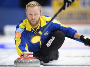 Swedish skip Niklas Edin curls against Norway at the European curling championships in St. Gallen, Switzerland, on Nov. 23.