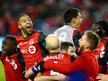 Toronto FC players are giddy after Victor Vazquez scores the second goal of the game in the 94th minute.