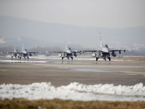 U.S. Air Force F-16 fighter jets take part in a joint aerial drills called Vigilant Ace between U.S and South Korea, at the Osan Air Base in Pyeongtaek, South Korea, Wednesday, Dec. 6, 2017. The five-day drill is meant to improve the allies' wartime capabilities and preparedness, South Korea's defense ministry said.