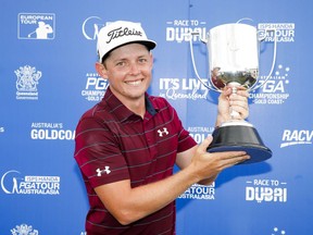 Golfer Cameron Smith holds the trophy after winning the Australian PGA Championships at RACV Royal Pines Resort on Sunday, Dec. 3, 2017 in Gold Coast, Australia. Smith won the Australian PGA Championship on Sunday with a par on the second hole of a playoff with fellow Australian Jordan Zunic.