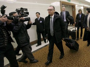 U.N. Undersecretary-General for Political Affairs Jeffrey Feltman, center, walks upon arrival at the Pyongyang International Airport in Pyongyang, North Korea, Tuesday, Dec. 5, 2017. The senior United Nations official arrived in Pyongyang for a very rare, four-day stay at the invitation of the North Korean government.