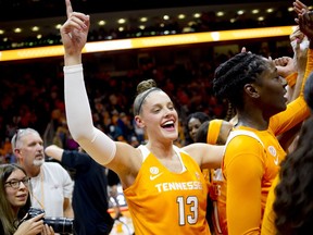 Tennessee forward Kortney Dunbar (13) celebrates after defeating Texas 82-75 in the second half of an NCAA college basketball game, Sunday, Dec. 10, 2017, in Knoxville, Tenn.