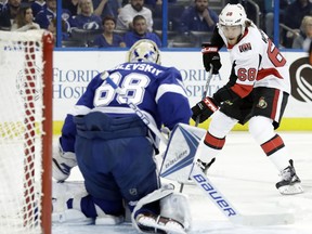 Ottawa Senators left wing Mike Hoffman (68) moves in for a shot on Tampa Bay Lightning goalie Andrei Vasilevskiy (88) during the first period of an NHL hockey game Thursday, Dec. 21, 2017, in Tampa, Fla.