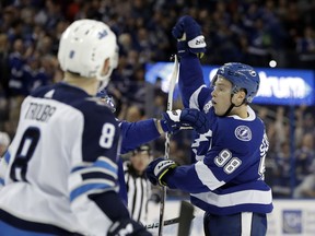 Tampa Bay Lightning defenseman Mikhail Sergachev (98) celebrates after his goal against the Winnipeg Jets during the second period of an NHL hockey game Saturday, Dec. 9, 2017, in Tampa, Fla.