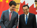 Prime Minister Justin Trudeau and China's Premier Li Keqiang during a signing ceremony at the Great Hall of the People in Beijing on Dec. 4, 2017.