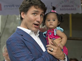 Canadian Prime Minister Justin Trudeau visits the Likhaan Women's Health centre in Manila, Philippines, on Sunday, November 12, 2017.
