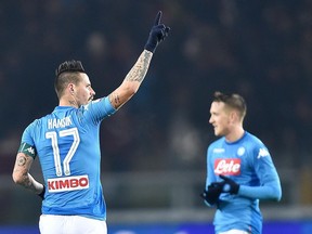 Napoli miedfielder Marek Hamsik celebrates after scoring his side's third goal during the Italian Serie A soccer match between Torino and Napoli at Olympic stadium in Turin, Italy, Saturday, Dec. 16, 2017.