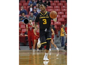 Kennesaw State's James Scott (3) dribbles the ball down the court during an NCAA college basketball game against Texas Tech, Wednesday, Dec. 13, 2017, in Lubbock, Texas.