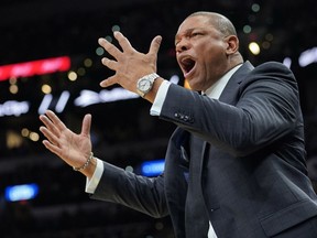 Los Angeles Clippers head coach Doc Rivers yells at a referee during the first half of an NBA basketball game against the San Antonio Spurs, Monday, Dec. 18, 2017, in San Antonio.