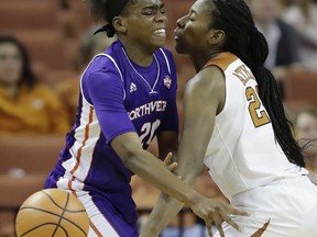 Texas guard Ariel Atkins (23) steps the ball away from Northwestern State forward Leah Barnes (20) during the first half of an NCAA college basketball game, Wednesday, Dec. 13, 2017, in Austin, Texas.
