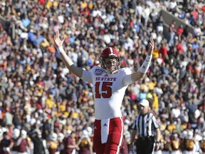 North Carolina State quarterback Ryan Finley looks for the touchdown call from the officials during the first half of the Sun Bowl NCAA college football game against Arizona State in El Paso, Texas, Friday, Dec. 29, 2017.