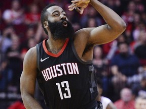 Houston Rockets guard James Harden celebrates a 3-point shot against the Los Angeles Clipers early in an NBA basketball game Friday, Dec. 22, 2017, in Houston.
