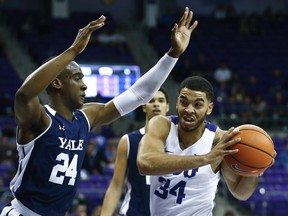 Yale guard Miye Oni (24) defends against TCU guard Enrich Williams (34) in the first half of an NCAA college basketball game on Saturday Dec. 2, 2017, in Fort Worth, Texas.