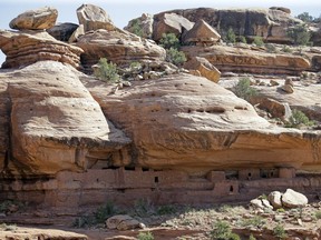 FILE - This July 15, 2016, file photo, shows the "Moonhouse" in McLoyd Canyon which is part of Bears Ears National Monument, near Blanding, Utah. President Donald Trump is expected to announce plans to shrink Bears Ears National Monument as well as Grand Staircase-Escalante National Monument in Utah that were created by past Democratic presidents.