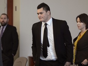 In this Tuesday, Dec. 5, 2017 photo, Osa Masina appears in court for his sentencing hearing at the Matheson Courthouse in Salt Lake City. Masina, a suspended University of Southern California football player who pleaded guilty to misdemeanor sexual assault, has been sentenced to one year in a Utah jail. The Deseret News reports that 20-year-old Masina, a Utah native, was sentenced Tuesday, Dec. 5, 2017, for three counts of sexual battery.