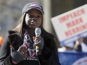 FILE - In this Jan. 18, 2016, file photo, 2nd Amendment rights activist, Shaneen Allen speaks during a pro-gun rally at Capitol Square in Richmond, Va. The Pennsylvania mother of two pardoned by New Jersey Gov. Chris Christie of gun charges, says she's more hopeful than ever that proposed federal firearm reciprocity legislation will become law despite uncertain prospects in the Senate.
