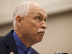 FILE - This Aug. 31, 2016 file photo shows Phil Van Cleave, president of the pro-gun Virginia Citizens Defense League, during a public hearing at the Capitol in Richmond, Va. Virginia Democrats, who made big gains in the swing state on Election Day, say their newfound clout has increased the odds of passing gun control measures in the coming year.