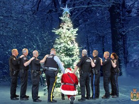 A Christmas card from the Abbotsfiord Police Department is shown in a handout photo. This year marks the sixth consecutive year that the Abbotsford Police Department has created a unique Christmas Card intended for a group of deserving recipients. THE CANADIAN PRESS/HO-Abbotsford Police Department MANDATORY CREDIT