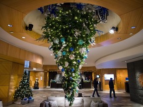 An upside down Christmas tree is seen suspended from the ceiling at the Fairmont Vancouver Airport hotel in Richmond, B.C., on Monday December 4, 2017.For those who like to up-end holiday traditions, this trend is for you: the upside down Christmas tree.