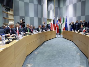 Members of the Visegrad Group meet on the sidelines of an EU summit in Brussels on Thursday, Dec. 14, 2017. European Union leaders are gathering in Brussels and are set to move Brexit talks into a new phase as pressure mounts on Prime Minister Theresa May over her plans to take Britain out of the 28-nation bloc. At right is Italian Prime Minister Paolo Gentiloni and left is Polish Prime Minister Mateusz Morawiecki.
