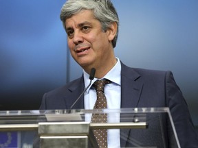 Portugal's Finance Minister Mario Centeno speaks during a media conference after a meeting of eurozone finance ministers at the Europa building in Brussels on Monday, Dec. 4, 2017. Eurozone finance ministers met Monday to elect a new president for the club of 19 nations that share the euro currency.